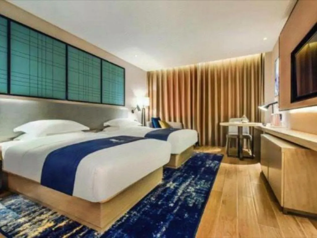Bed in Echarm Hotel Anshun High-speed Railway Station Jichang Road