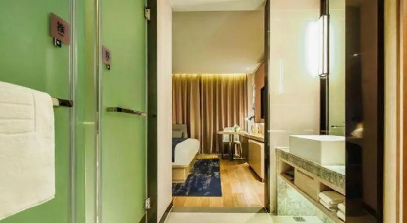 Bed in Echarm Hotel Anshun High-speed Railway Station Jichang Road