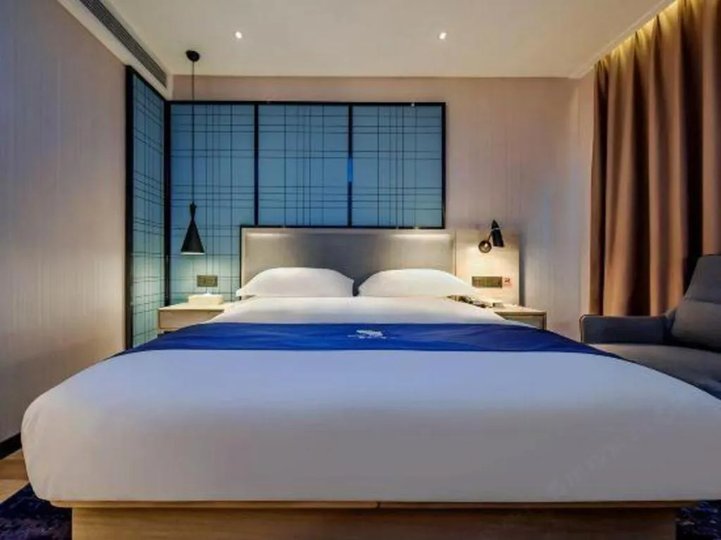 Bed in Echarm Hotel Anshun High-speed Railway Station Jichang Road