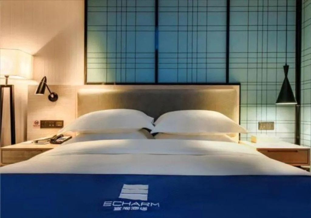 Bed in Echarm Hotel Anshun High-speed Railway Station Jichang Road