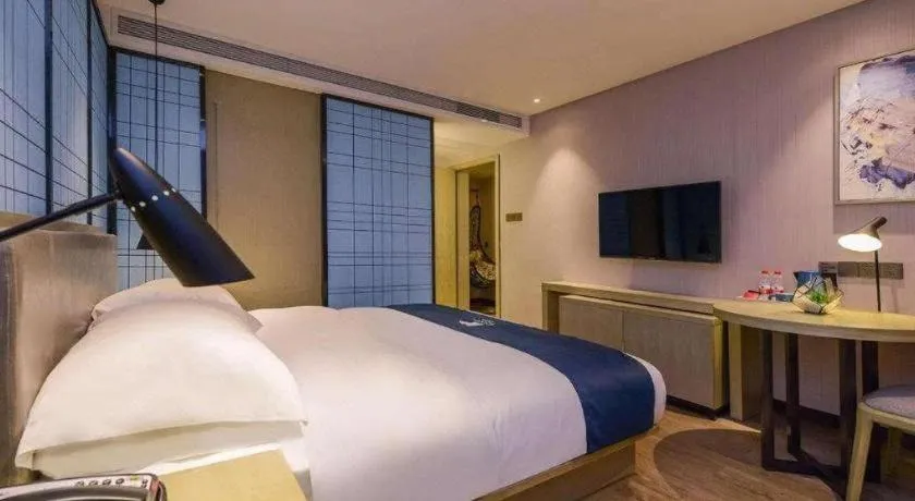 Bed in Echarm Hotel Anshun High-speed Railway Station Jichang Road