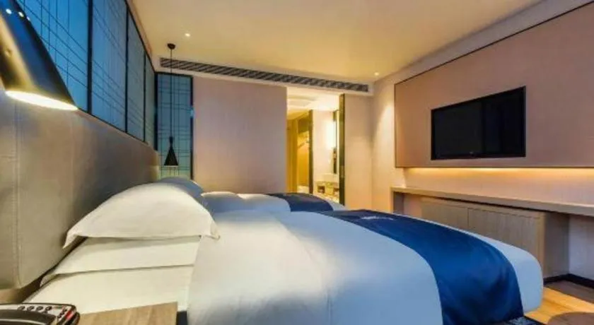 Bed in Echarm Hotel Anshun High-speed Railway Station Jichang Road