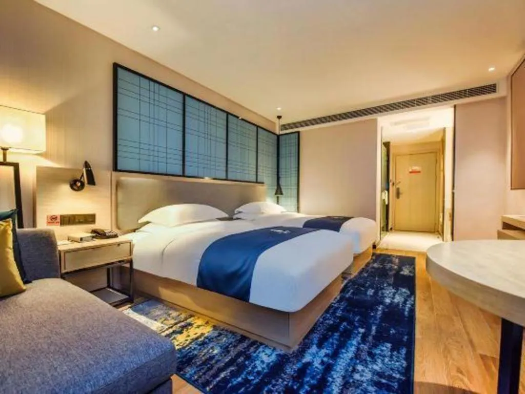 Bed in Echarm Hotel Anshun High-speed Railway Station Jichang Road