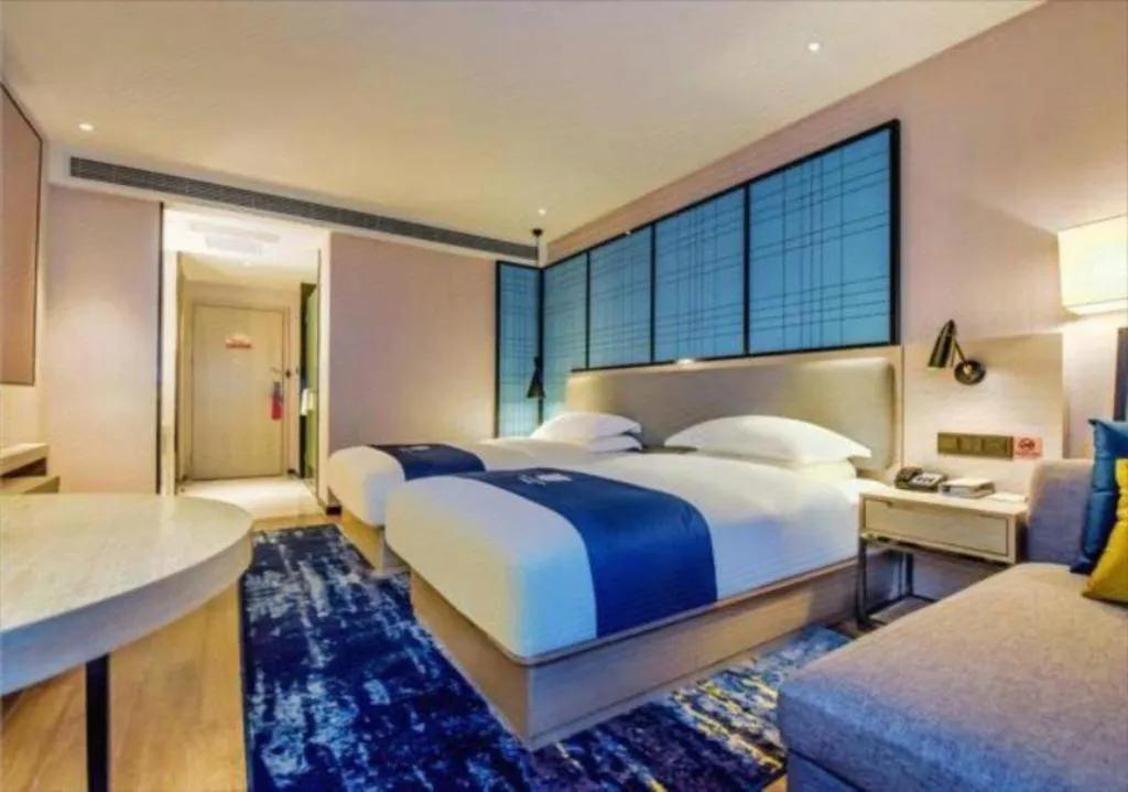 Bed in Echarm Hotel Anshun High-speed Railway Station Jichang Road