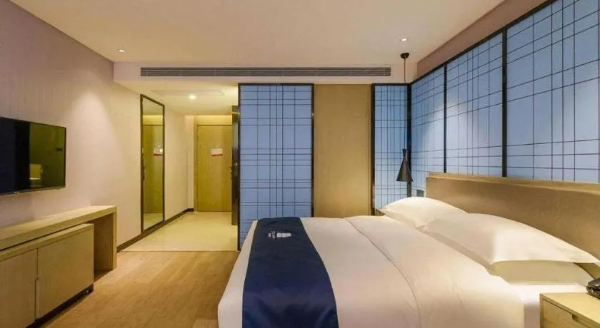 Bed in Echarm Hotel Anshun High-speed Railway Station Jichang Road