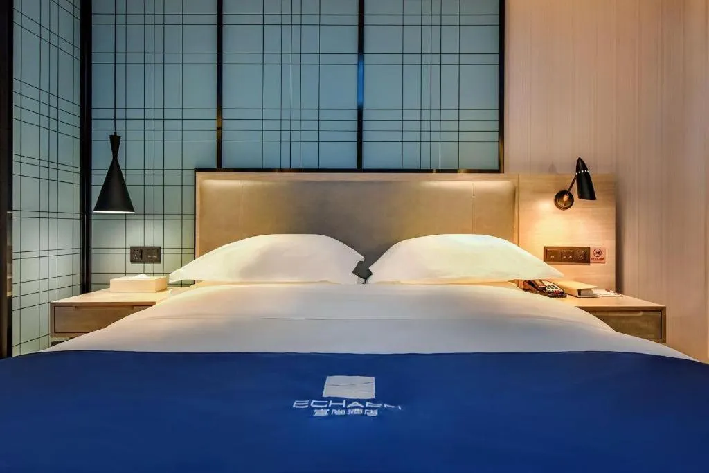 Bed in Echarm Hotel Anshun High-speed Railway Station Jichang Road