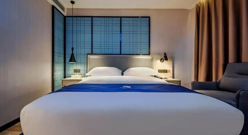 Bed in Echarm Hotel Anshun High-speed Railway Station Jichang Road