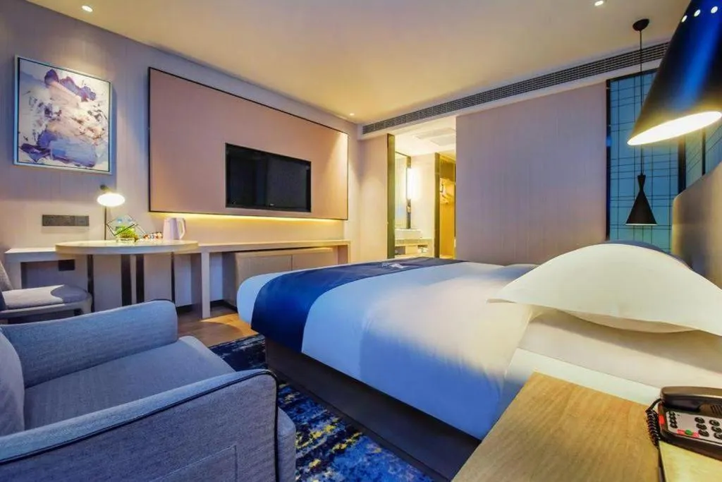 Bed in Echarm Hotel Anshun High-speed Railway Station Jichang Road