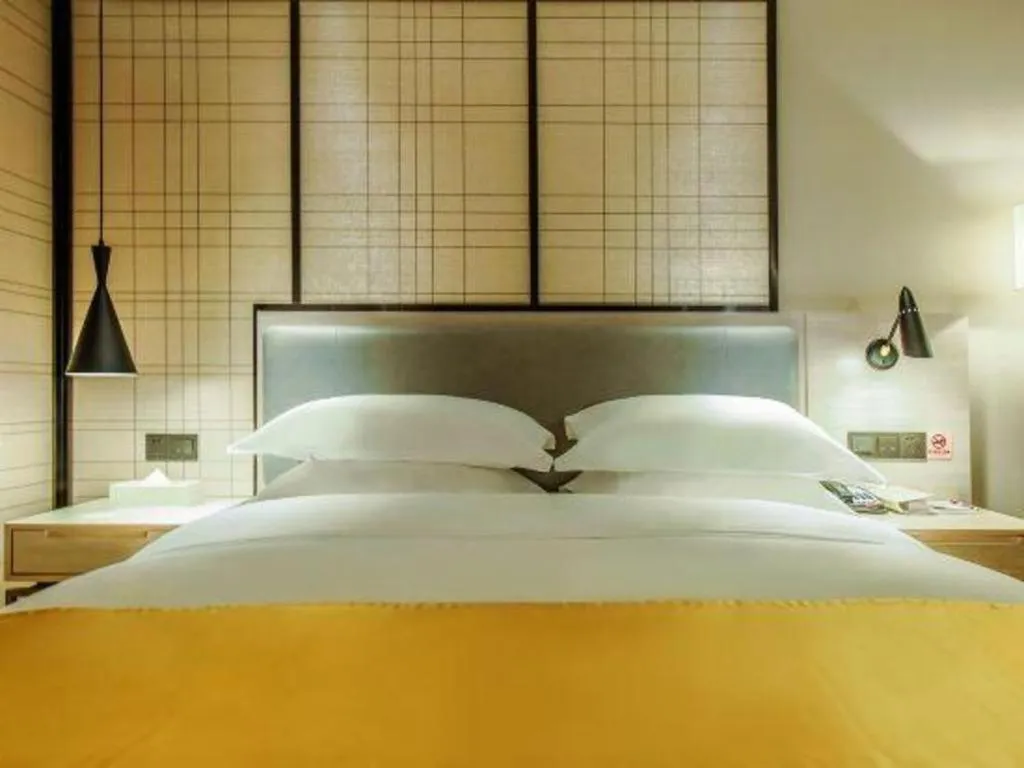Bed in Echarm Hotel Anshun High-speed Railway Station Jichang Road