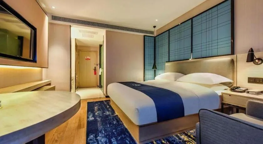 Bed in Echarm Hotel Anshun High-speed Railway Station Jichang Road