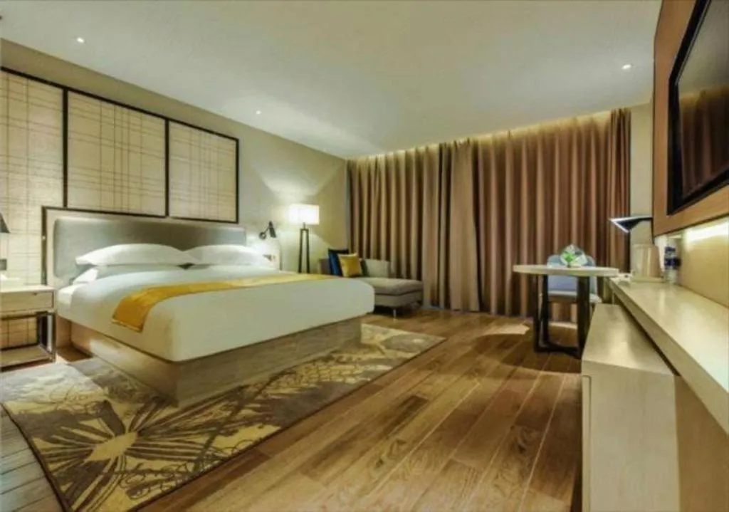 Bed in Echarm Hotel Anshun High-speed Railway Station Jichang Road
