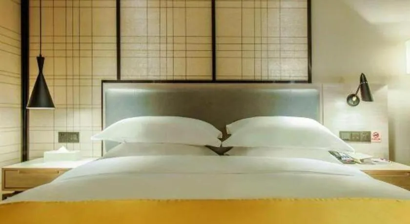 Bed in Echarm Hotel Anshun High-speed Railway Station Jichang Road