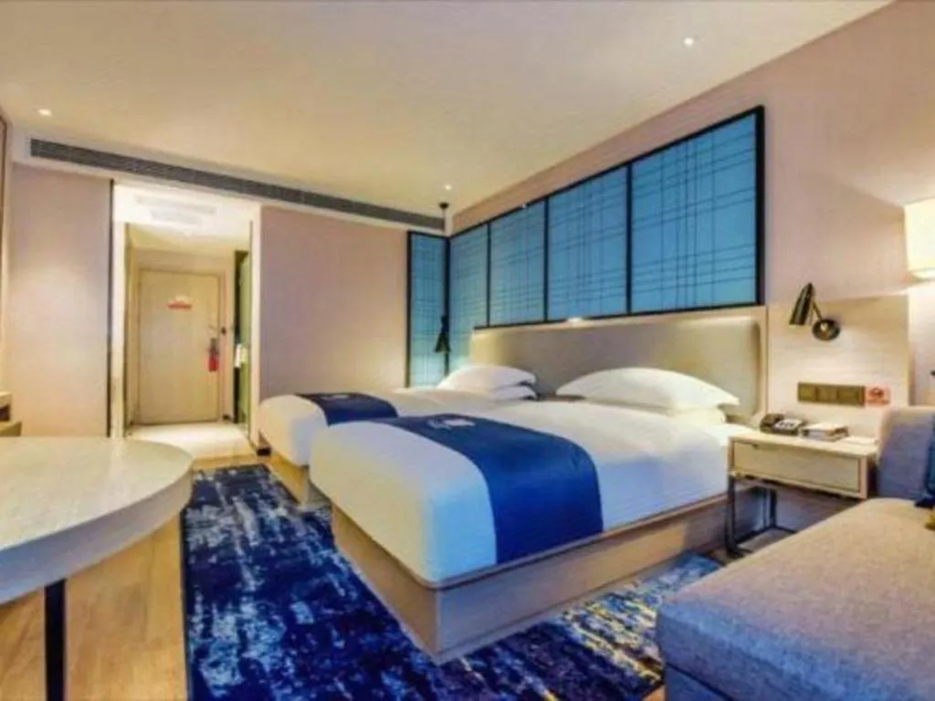 Bed in Echarm Hotel Anshun High-speed Railway Station Jichang Road