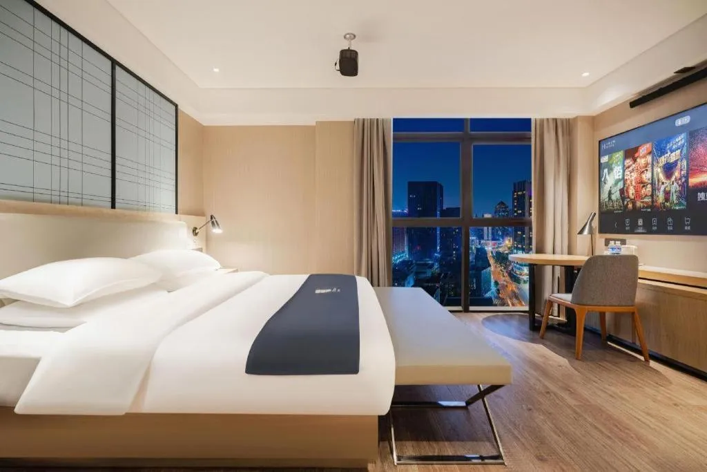 Bed in Echarm Hotel Wuhan Hankou Station Changgang Road Metro Station