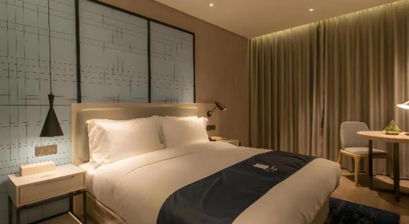 Bed in Echarm Hotel Wuhan Hankou Station Changgang Road Metro Station
