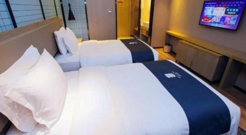 Bed in Echarm Hotel Nanning Guangxi University Xinyang Longteng District Maternal and Child Hospital