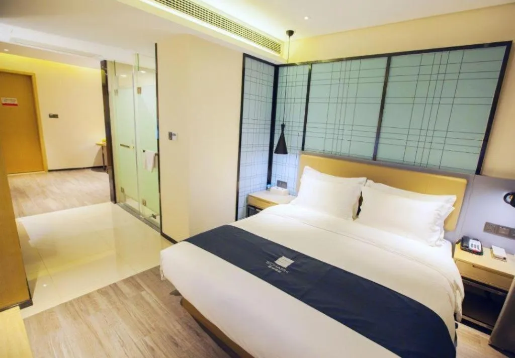 Bed in Echarm Hotel Nanning Guangxi University Xinyang Longteng District Maternal and Child Hospital