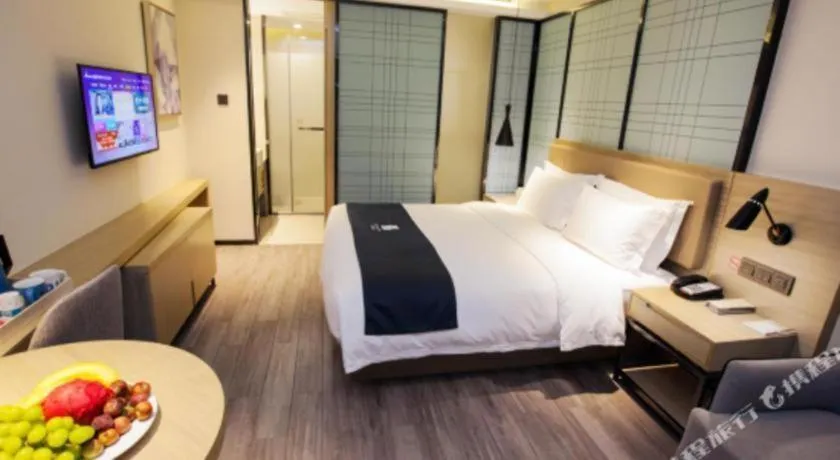 Bed in Echarm Hotel Nanning Guangxi University Xinyang Longteng District Maternal and Child Hospital