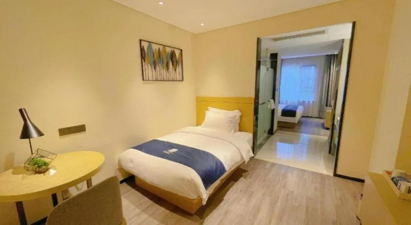 Bed in Echarm Hotel Nanning Guangxi University Xinyang Longteng District Maternal and Child Hospital