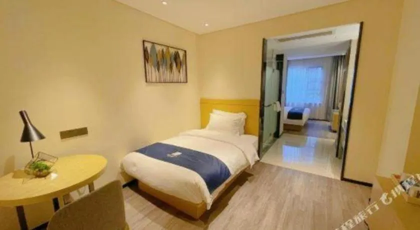 Bed in Echarm Hotel Nanning Guangxi University Xinyang Longteng District Maternal and Child Hospital