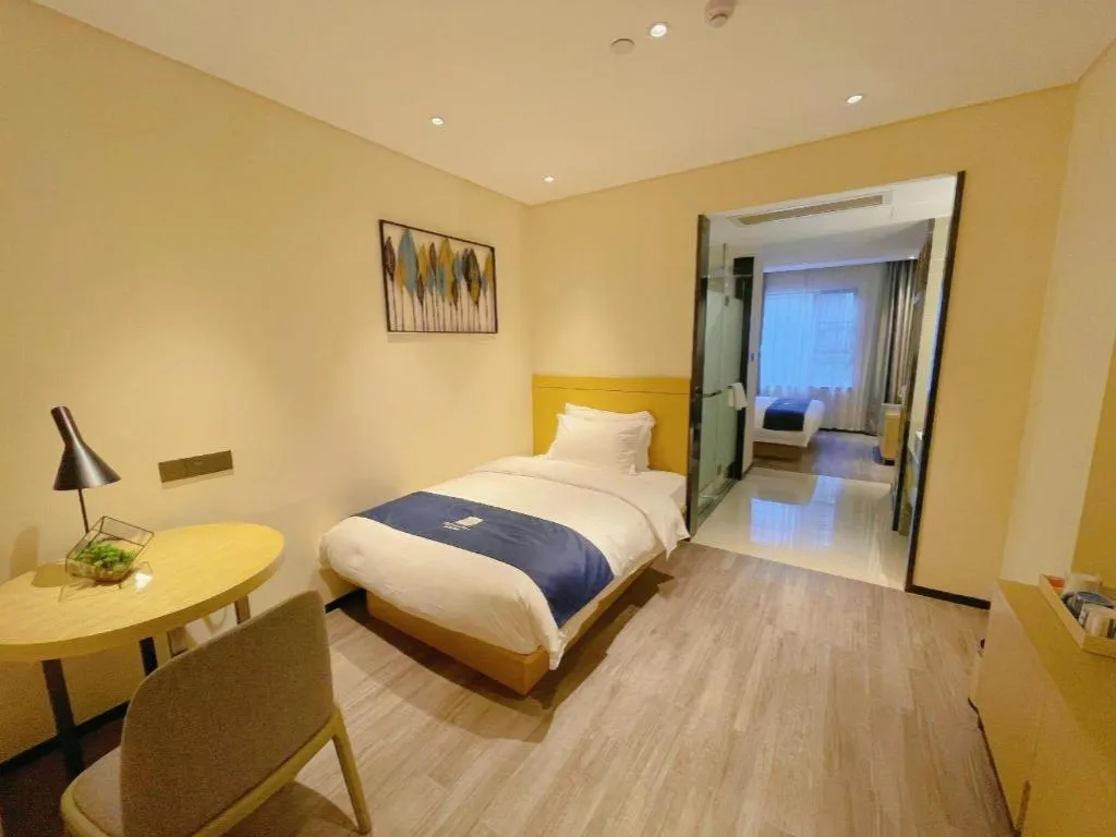 Bed in Echarm Hotel Nanning Guangxi University Xinyang Longteng District Maternal and Child Hospital