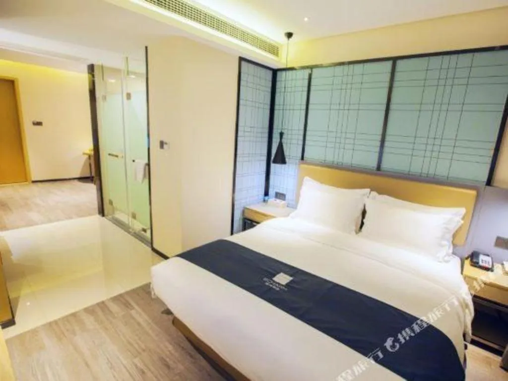 Bed in Echarm Hotel Nanning Guangxi University Xinyang Longteng District Maternal and Child Hospital