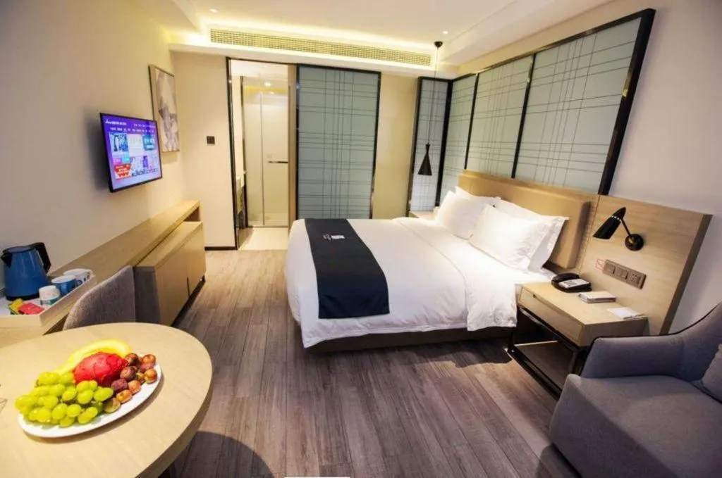 Bed in Echarm Hotel Nanning Guangxi University Xinyang Longteng District Maternal and Child Hospital