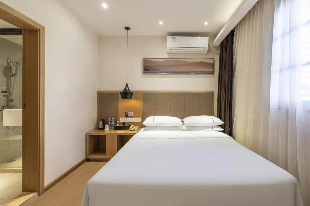 Bed in City Comfort Inn Wuhan Jianghan Road Liuduqiao Metro Station