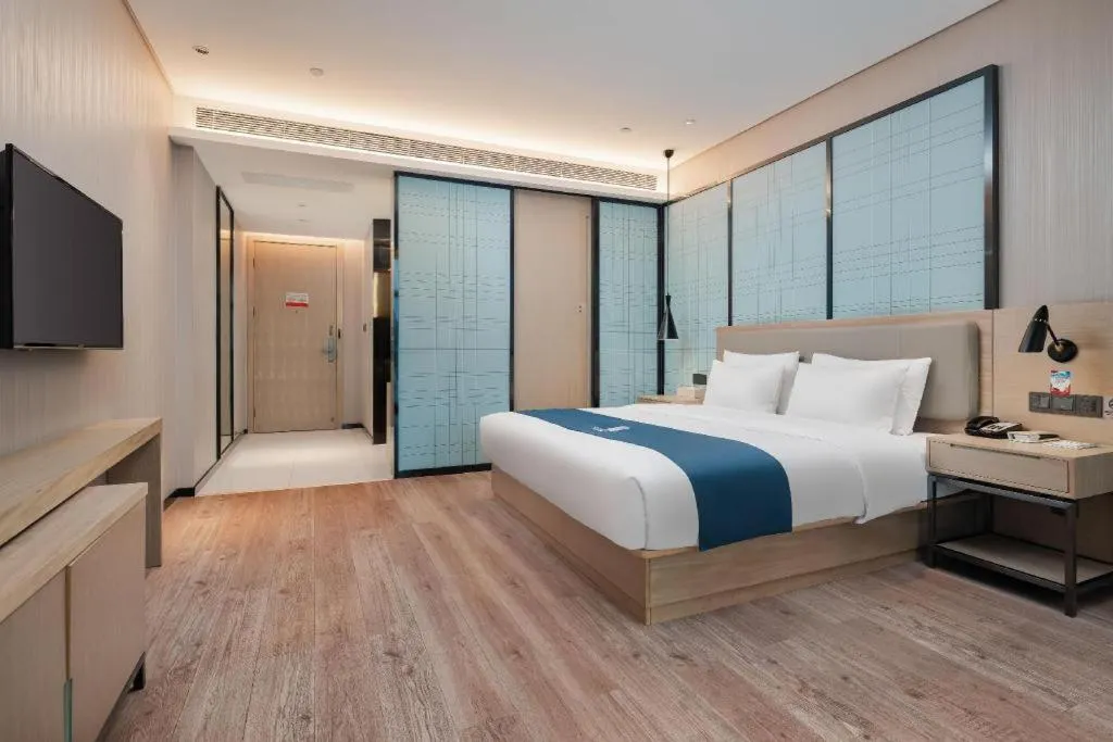 Bed in Echarm Hotel Liuzhou Liunan Wanda Plaza