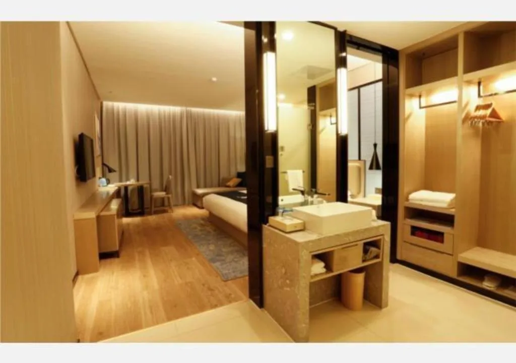 Bed in Echarm Hotel Liuzhou Liunan Wanda Plaza