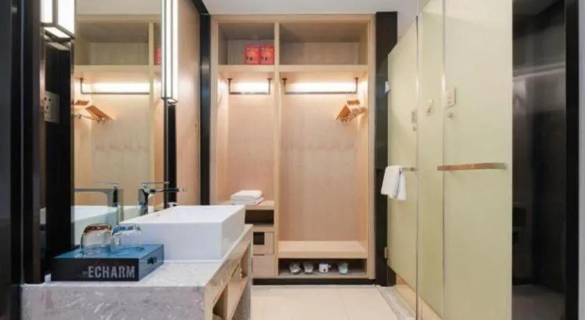 Bed in Echarm Hotel Liuzhou Liunan Wanda Plaza