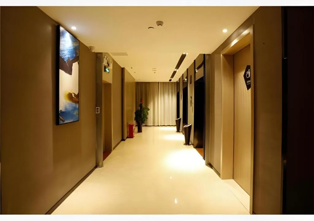 Bed in Echarm Hotel Liuzhou Liunan Wanda Plaza