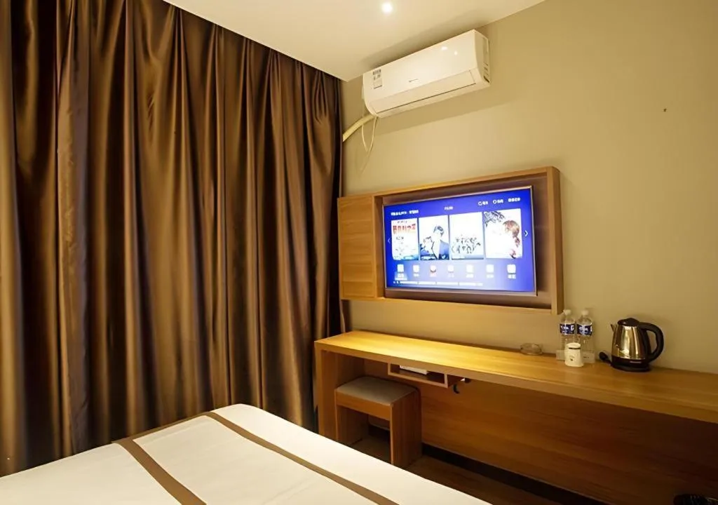 Bed in Jtour Inn Huanggang Wuxue City Square