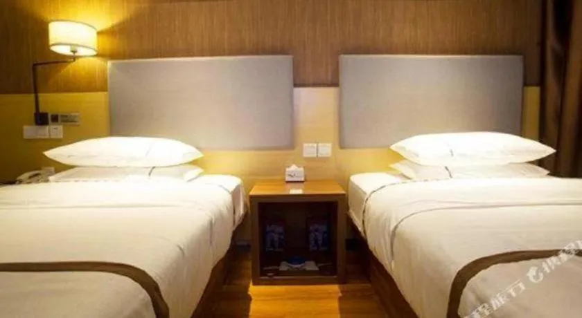 Bed in Jtour Inn Huanggang Wuxue City Square