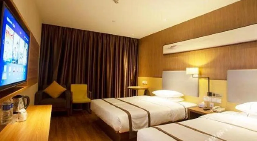 Bed in Jtour Inn Huanggang Wuxue City Square