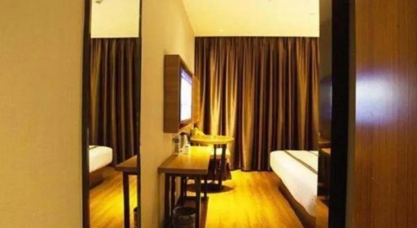 Bed in Jtour Inn Huanggang Wuxue City Square