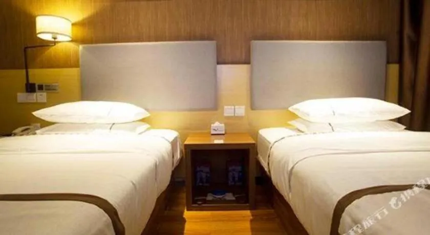 Bed in Jtour Inn Huanggang Wuxue City Square