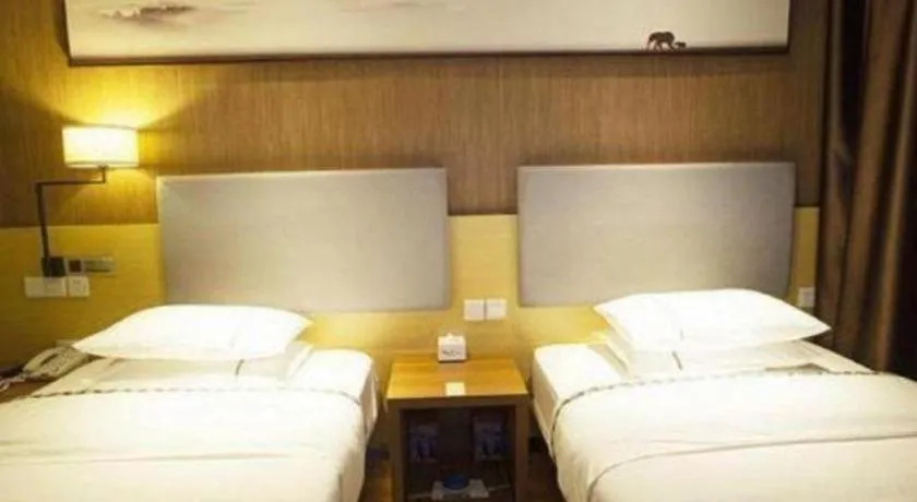 Bed in Jtour Inn Huanggang Wuxue City Square