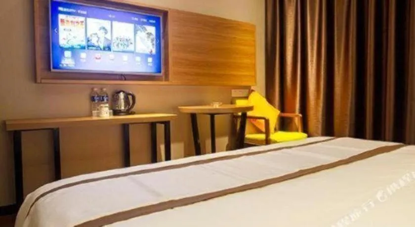 Bed in Jtour Inn Huanggang Wuxue City Square