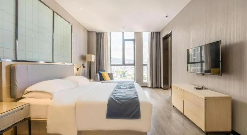 Bed in Echarm Hotel An'xi Hengxing Coach Station