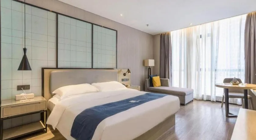 Bed in Echarm Hotel An'xi Hengxing Coach Station