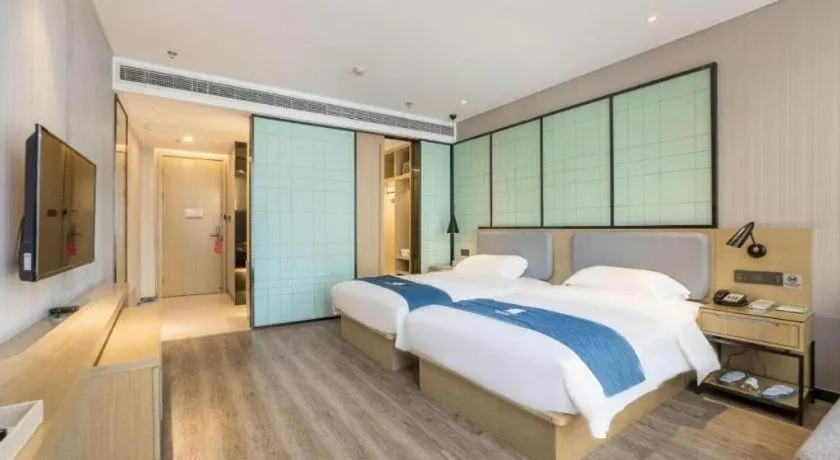 Bed in Echarm Hotel An'xi Hengxing Coach Station