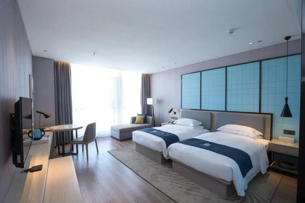 Bed in Echarm Hotel An'xi Hengxing Coach Station