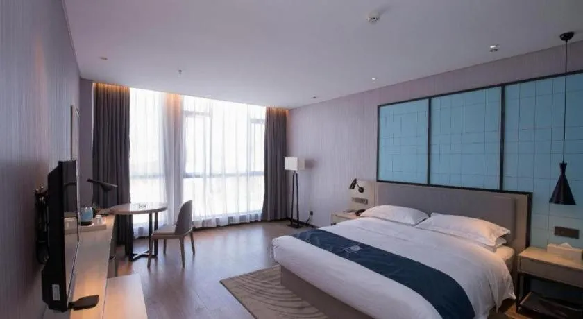 Bed in Echarm Hotel An'xi Hengxing Coach Station