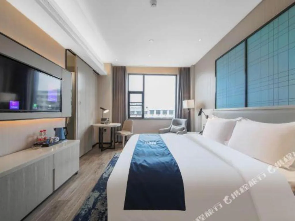 Bed in Echarm Hotel An'xi Hengxing Coach Station