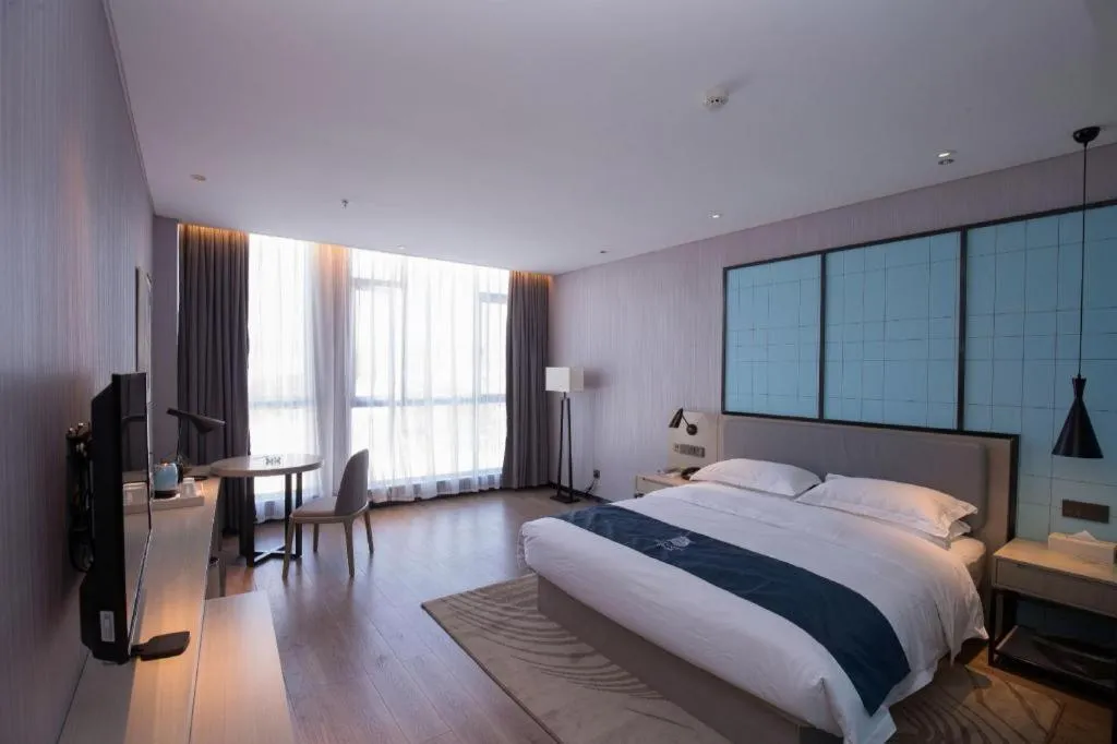 Bed in Echarm Hotel An'xi Hengxing Coach Station