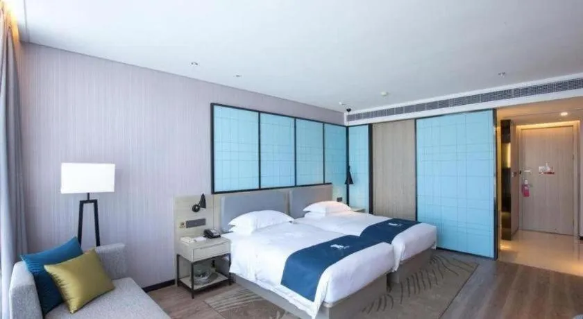 Bed in Echarm Hotel An'xi Hengxing Coach Station