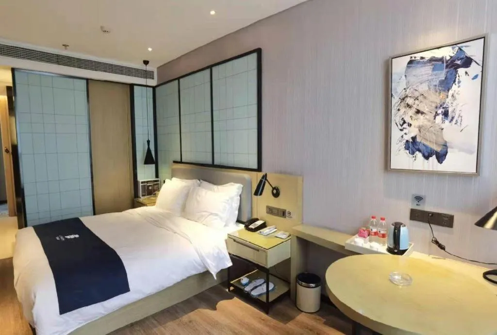 Bed in Echarm Hotel An'xi Hengxing Coach Station