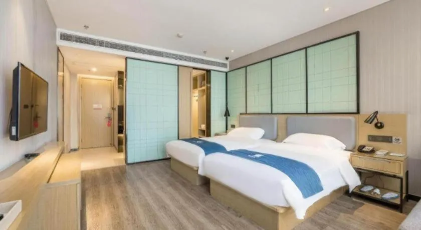 Bed in Echarm Hotel An'xi Hengxing Coach Station