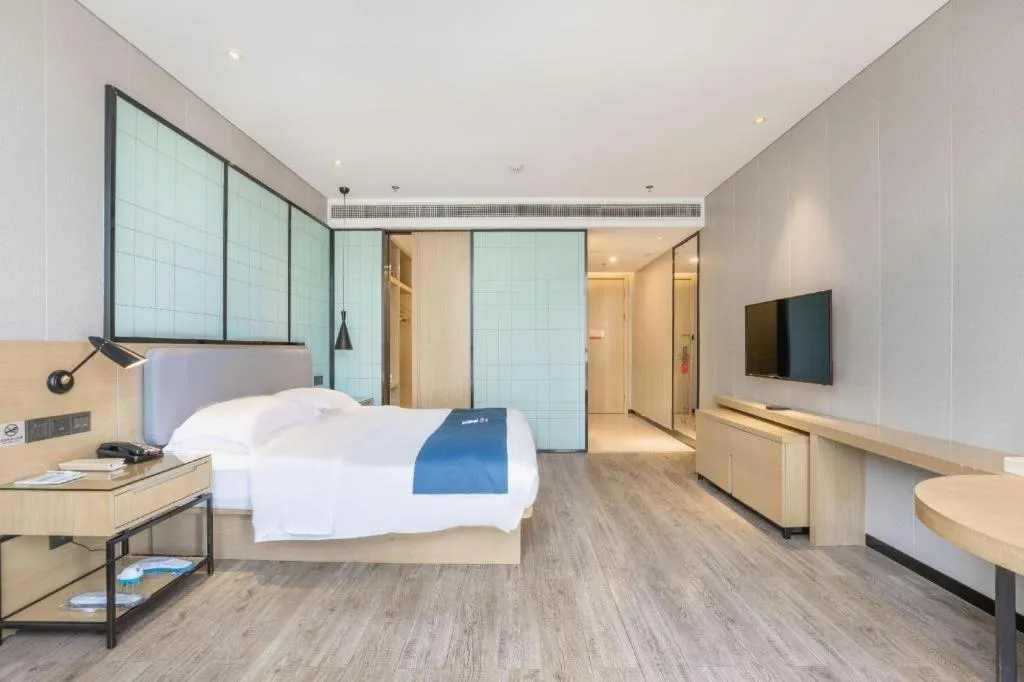 Bed in Echarm Hotel An'xi Hengxing Coach Station